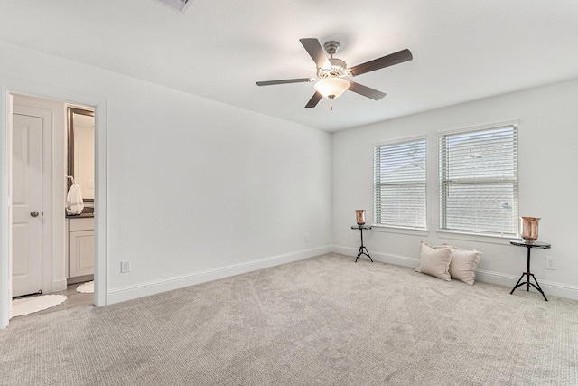 1059 Lakemont Bend Ln, Pinehurst, TX 77362 - empty room featuring carpet floors, ceiling fan, and baseboards