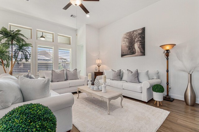 1059 Lakemont Bend Ln, Pinehurst, TX 77362 - living area with ceiling fan, baseboards, wood finished floors, and recessed lighting