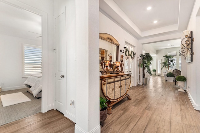 1059 Lakemont Bend Ln, Pinehurst, TX 77362 - corridor featuring light wood-type flooring, baseboards, and recessed lighting
