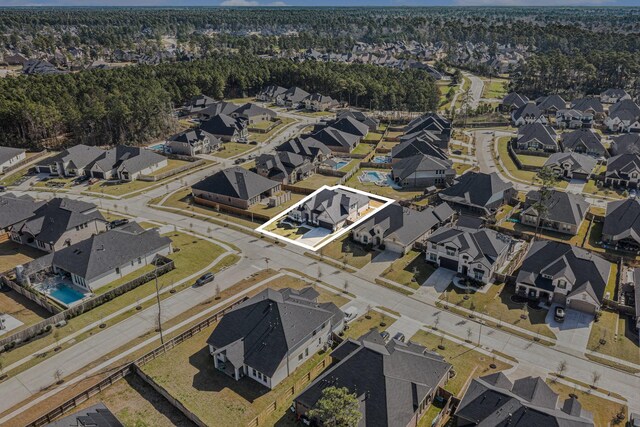 1059 Lakemont Bend Ln, Pinehurst, TX 77362 - view of property location with nearby suburban area and property parcel outlined