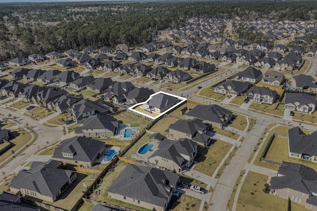 1059 Lakemont Bend Ln, Pinehurst, TX 77362 - aerial overview of property's location featuring nearby suburban area