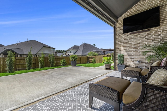 1059 Lakemont Bend Ln, Pinehurst, TX 77362 - fenced backyard with a patio and a residential view