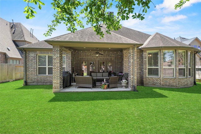 15019 Turquoise Mist Dr, Cypress, TX 77433 - rear view of house featuring outdoor lounge area, a ceiling fan, brick siding, and a patio