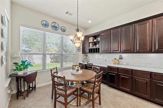 15019 Turquoise Mist Dr, Cypress, TX 77433 - dining space featuring light tile patterned floors, baseboards, a chandelier, and recessed lighting