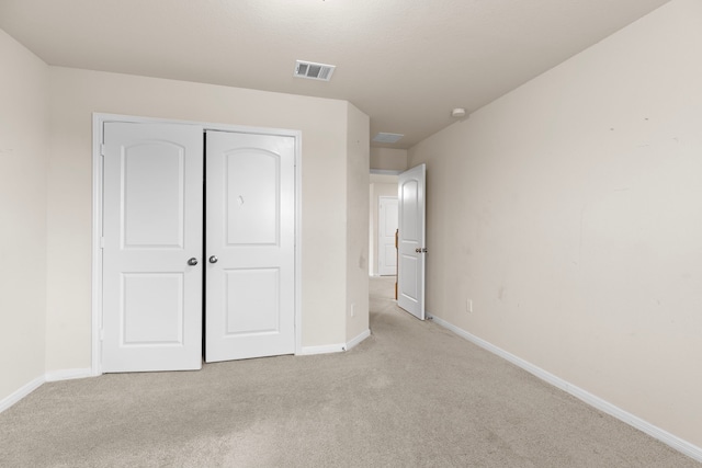 7603 Millstone Trail Ln, Richmond, TX 77469 - unfurnished bedroom with light colored carpet, baseboards, and a closet