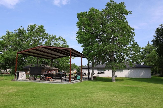 13911 W Richmond St, Needville, TX 77461 - view of grassy yard with a patio
