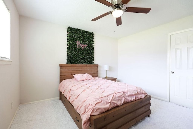 13911 W Richmond St, Needville, TX 77461 - bedroom with carpet floors, baseboards, and a ceiling fan