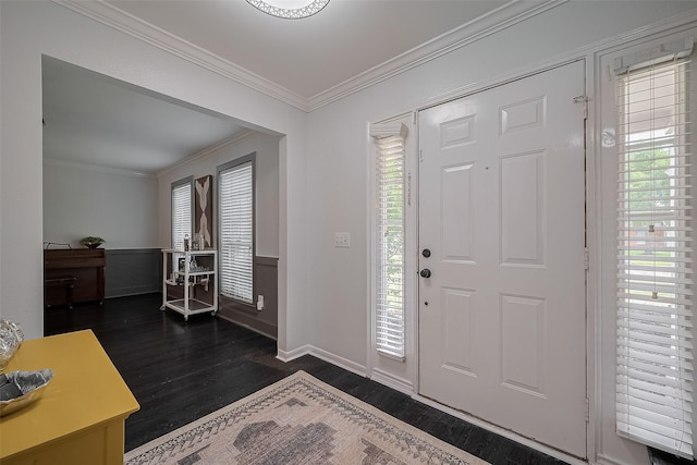 18206 Lake Bend Dr, Houston, TX 77084 - foyer featuring dark wood-type flooring, ornamental molding, healthy amount of natural light, and wainscoting