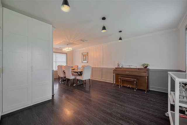 18206 Lake Bend Dr, Houston, TX 77084 - dining area with dark wood-type flooring, crown molding, and wainscoting