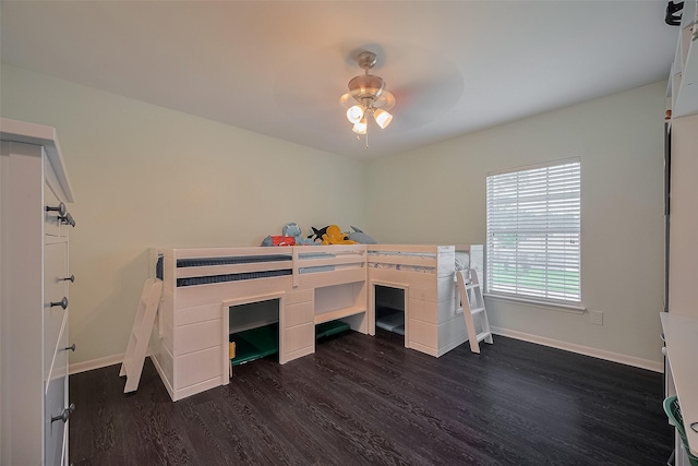 18206 Lake Bend Dr, Houston, TX 77084 - unfurnished bedroom with dark wood-type flooring and baseboards