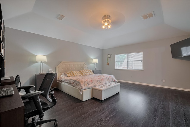 18206 Lake Bend Dr, Houston, TX 77084 - bedroom with dark wood finished floors, an office area, vaulted ceiling, and baseboards