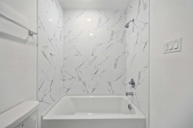 2310 Wavell St, Houston, TX 77088 - full bathroom featuring toilet, a textured wall, and shower / bath combination