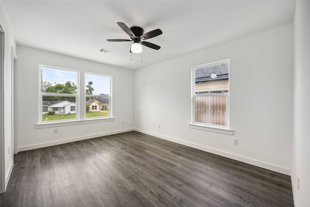 2310 Wavell St, Houston, TX 77088 - spare room with ceiling fan, dark wood-style flooring, and baseboards
