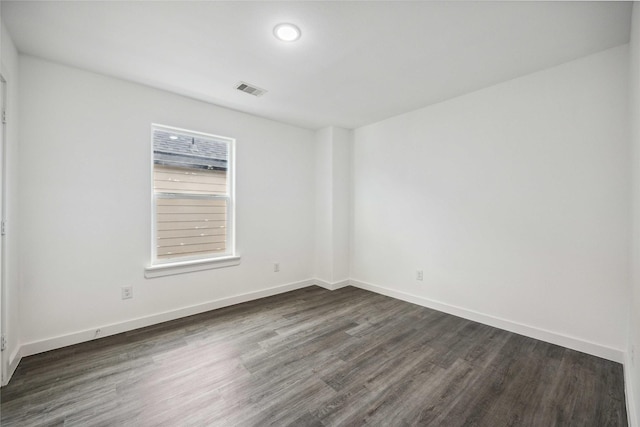 2310 Wavell St, Houston, TX 77088 - unfurnished room featuring dark wood-style flooring and baseboards