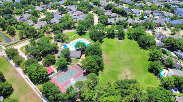 8910 Burleson Ct, Houston, TX 77064 - aerial perspective of suburban area with a pool area