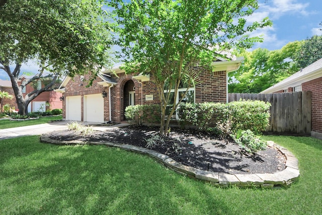 8910 Burleson Ct, Houston, TX 77064 - view of front of property with brick siding, an attached garage, and concrete driveway