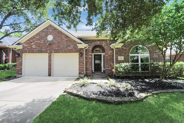 8910 Burleson Ct, Houston, TX 77064 - view of front of house with brick siding, a garage, and driveway