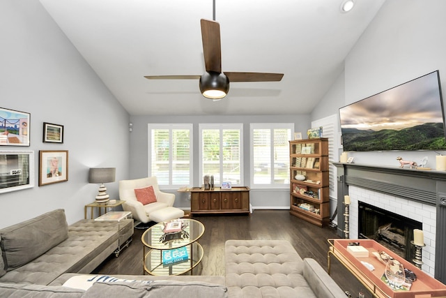 8910 Burleson Ct, Houston, TX 77064 - living area featuring lofted ceiling, dark wood-style flooring, a ceiling fan, and a brick fireplace