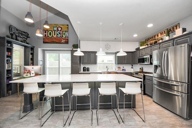 8910 Burleson Ct, Houston, TX 77064 - kitchen with appliances with stainless steel finishes, tasteful backsplash, a sink, light countertops, and recessed lighting