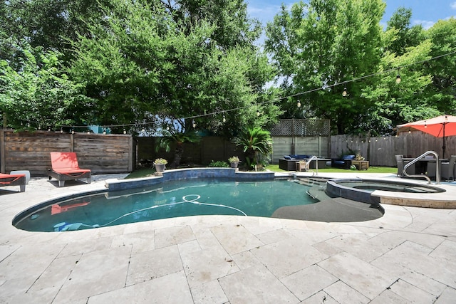 8910 Burleson Ct, Houston, TX 77064 - view of swimming pool with a fenced backyard, a patio, and a pool with connected hot tub