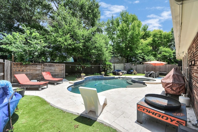 8910 Burleson Ct, Houston, TX 77064 - view of pool featuring a fenced backyard, a patio, and a pool with connected hot tub