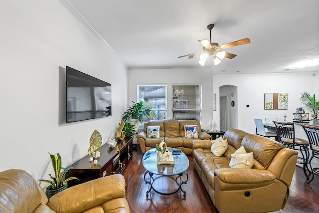 5306 Brookway Dr, Houston, TX 77084 - living area with arched walkways, wood finished floors, a ceiling fan, and crown molding