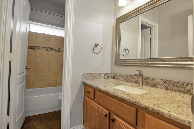 3014 Brahman Dr, Manvel, TX 77578 - full bath featuring vanity, wood finished floors, shower / bathtub combination, and toilet
