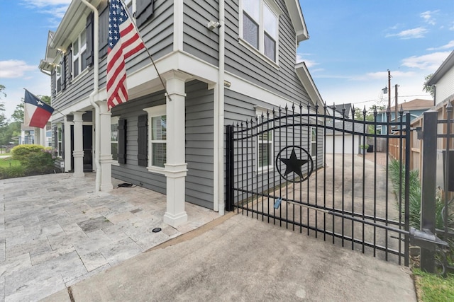 970 W 41st St, Houston, TX 77018 - view of property exterior with a gate