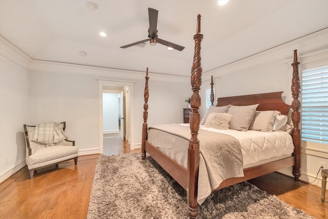 970 W 41st St, Houston, TX 77018 - bedroom with wood finished floors, recessed lighting, baseboards, ornamental molding, and a ceiling fan