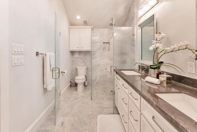 970 W 41st St, Houston, TX 77018 - bathroom featuring marble finish flooring, double vanity, a marble finish shower, toilet, and baseboards