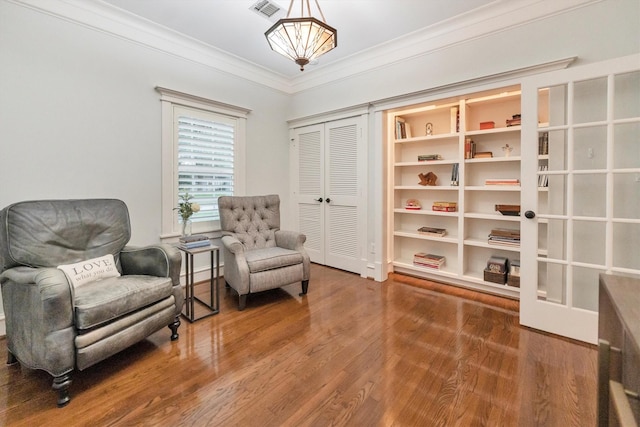 970 W 41st St, Houston, TX 77018 - sitting room featuring crown molding and wood finished floors