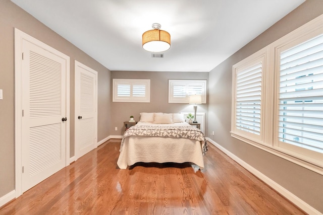 970 W 41st St, Houston, TX 77018 - bedroom with light wood finished floors and baseboards