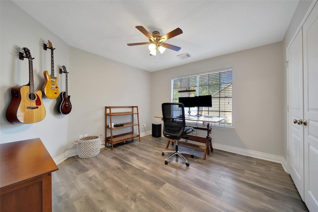 18 Heather Wisp Ct, Spring, TX 77381 - home office with a ceiling fan, wood finished floors, and baseboards