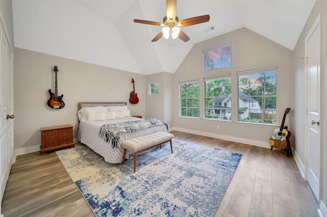 18 Heather Wisp Ct, Spring, TX 77381 - bedroom featuring vaulted ceiling, wood finished floors, baseboards, and a ceiling fan
