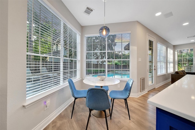 18 Heather Wisp Ct, Spring, TX 77381 - dining area with light wood-style flooring, baseboards, and recessed lighting
