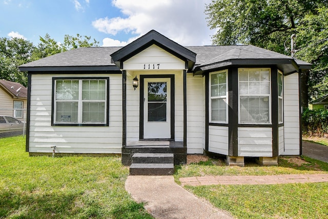 1117 King St, Houston, TX 77022 - bungalow-style home featuring a shingled roof