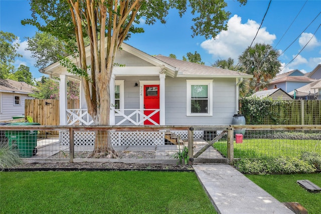 724 E 21st St, Houston, TX 77008 - view of front of home featuring a porch, a gate, and central AC unit