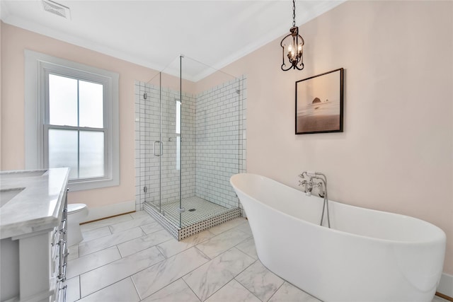 724 E 21st St, Houston, TX 77008 - bathroom with a freestanding tub, a shower stall, marble look tile flooring, a chandelier, and ornamental molding