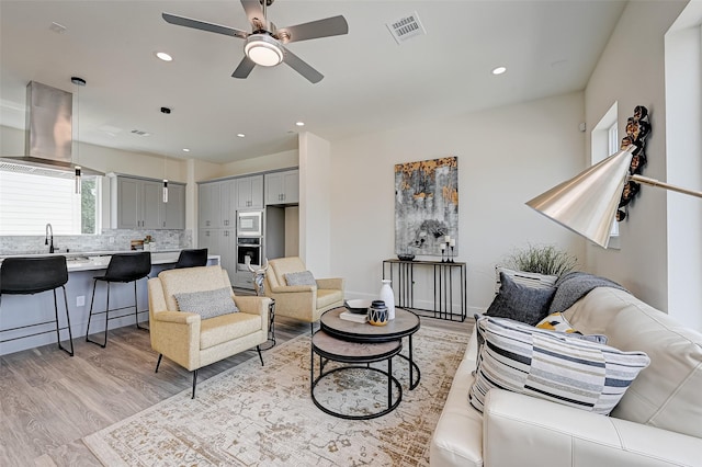 2905 Nagle St, Houston, TX 77004 - living room with ceiling fan, light wood finished floors, and recessed lighting