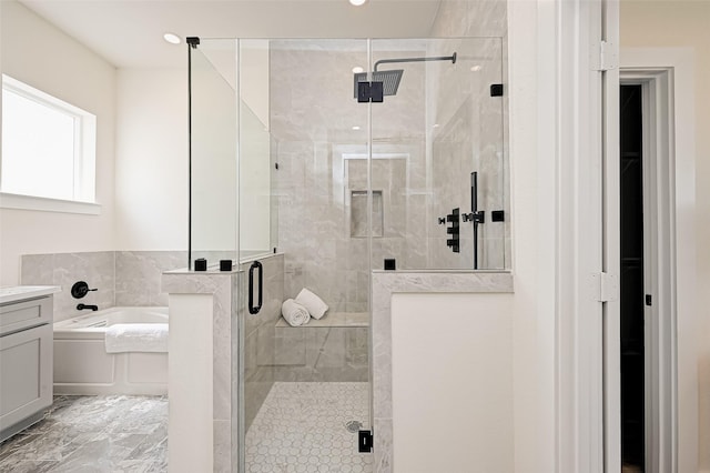 2905 Nagle St, Houston, TX 77004 - bathroom featuring a bath, a shower stall, vanity, marble finish floors, and recessed lighting