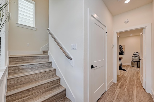2905 Nagle St, Houston, TX 77004 - stairs with wood finished floors, baseboards, and recessed lighting