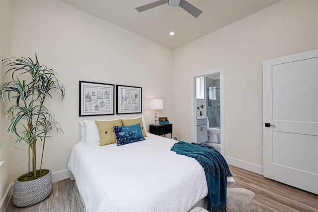 2905 Nagle St, Houston, TX 77004 - bedroom featuring wood finished floors, baseboards, connected bathroom, recessed lighting, and a ceiling fan