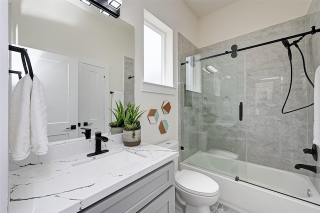 2905 Nagle St, Houston, TX 77004 - bathroom with toilet, vanity, and enclosed tub / shower combo