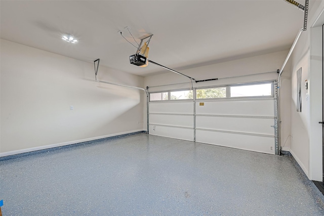 2905 Nagle St, Houston, TX 77004 - garage featuring a garage door opener and baseboards