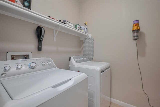 4323 N Vineyard Mdw Ln, Katy, TX 77449 - laundry room featuring washing machine and clothes dryer
