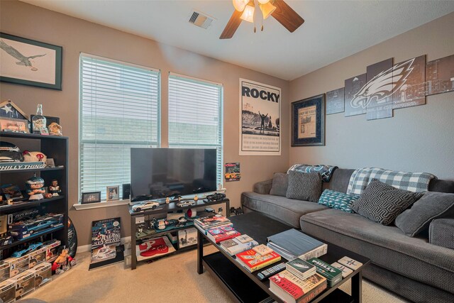 4323 N Vineyard Mdw Ln, Katy, TX 77449 - carpeted living room featuring a ceiling fan and plenty of natural light