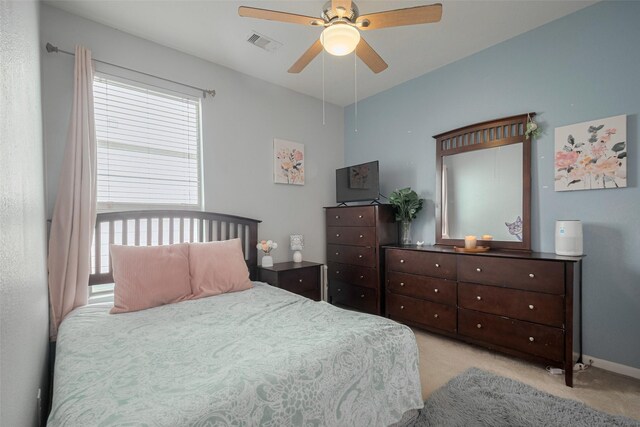 4323 N Vineyard Mdw Ln, Katy, TX 77449 - bedroom featuring multiple windows, light colored carpet, and a ceiling fan