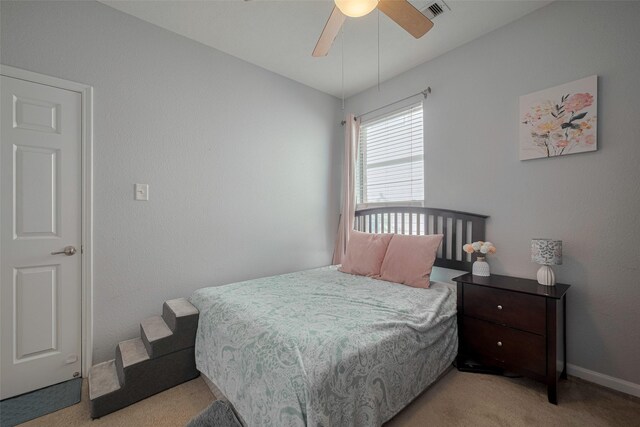 4323 N Vineyard Mdw Ln, Katy, TX 77449 - carpeted bedroom with ceiling fan and baseboards