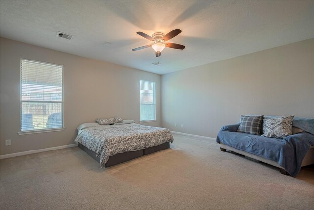 4323 N Vineyard Mdw Ln, Katy, TX 77449 - bedroom with carpet flooring, baseboards, and ceiling fan