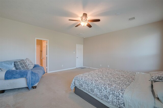 4323 N Vineyard Mdw Ln, Katy, TX 77449 - bedroom featuring light colored carpet, baseboards, and a ceiling fan